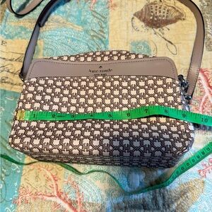 Kate Spade Cream Crossbody Bag with Signature Style